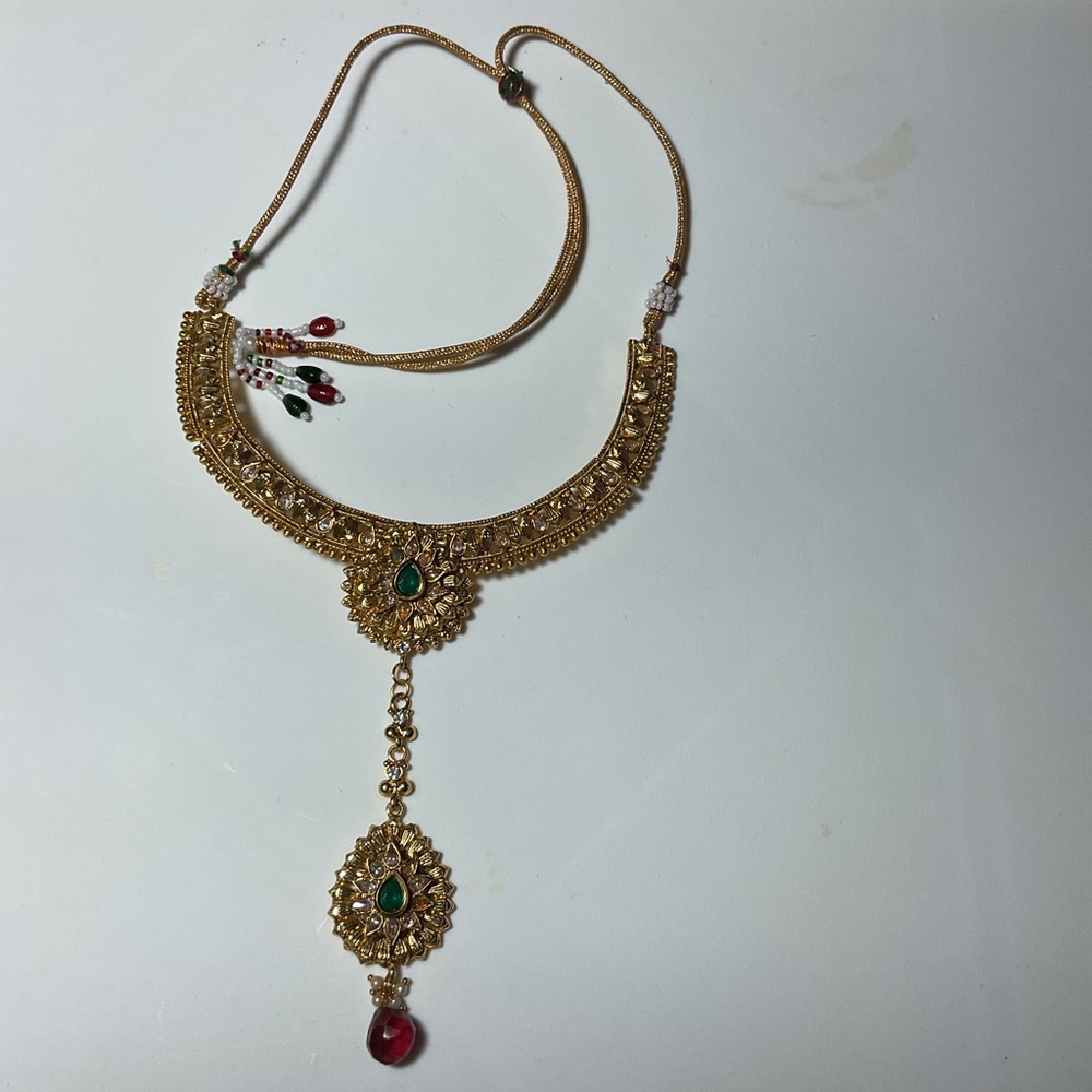 Elegant Gold Necklace with Green and Red Accents